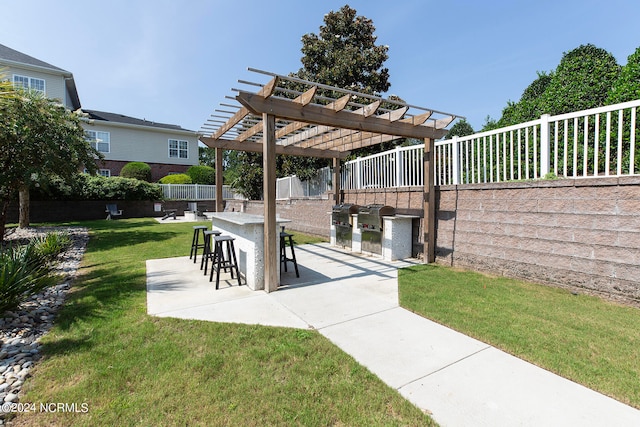 surrounding community featuring a pergola, a yard, and a patio