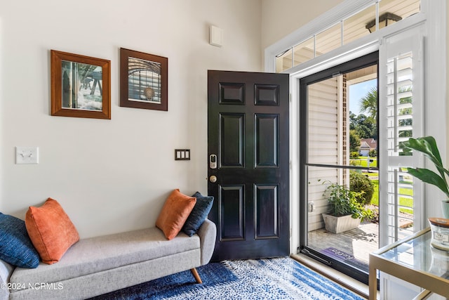 entrance foyer with plenty of natural light and hardwood / wood-style floors