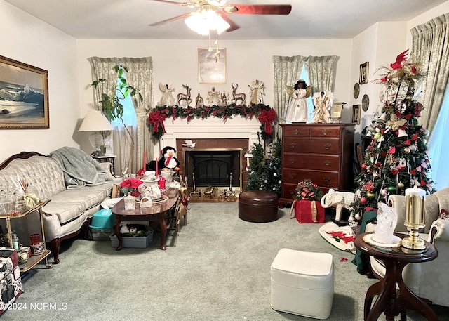 living room featuring carpet and ceiling fan