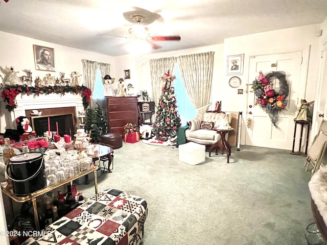 interior space with ceiling fan