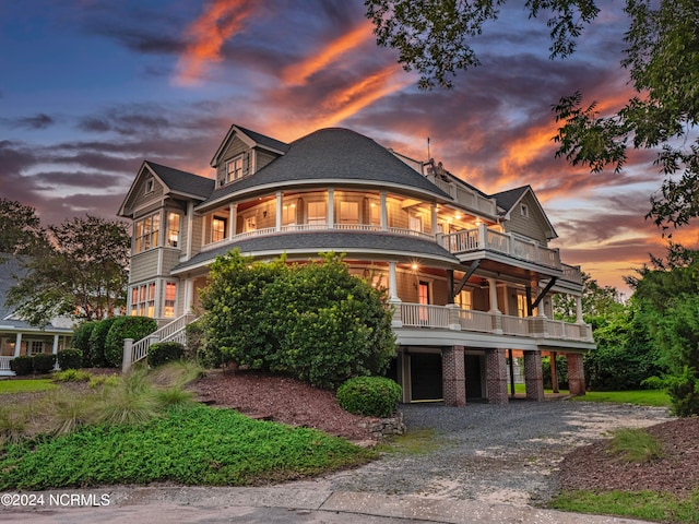 view of front of home with a balcony