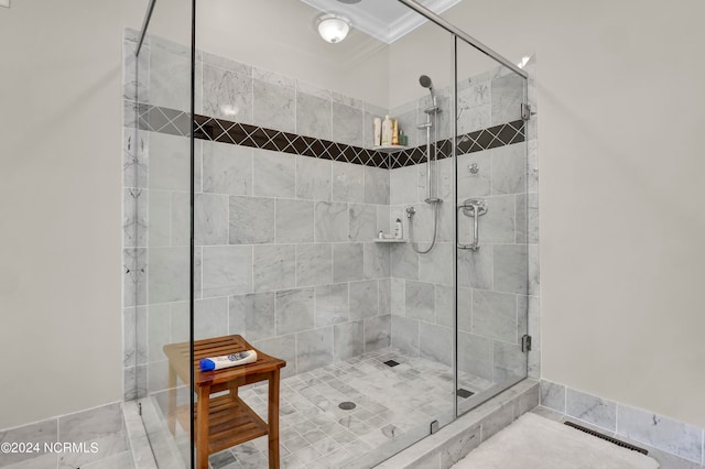 bathroom with walk in shower, ornamental molding, and tile patterned flooring