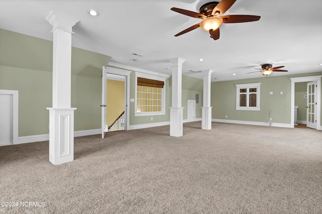 basement with light carpet and ceiling fan