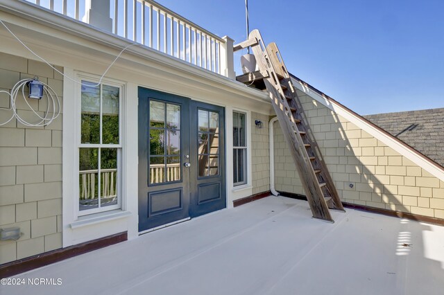 doorway to property featuring french doors