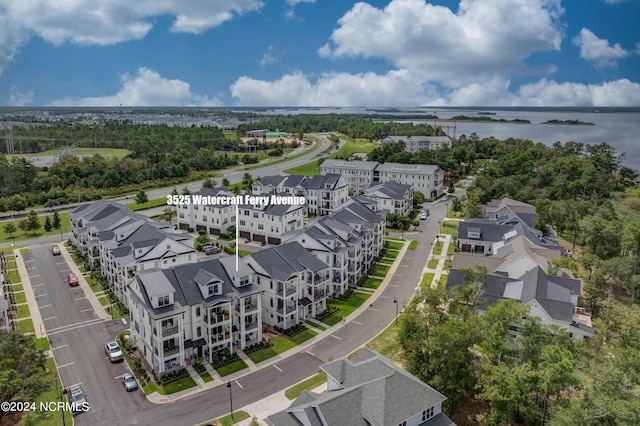 aerial view with a water view and a residential view