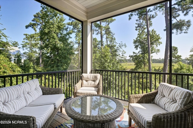 sunroom / solarium with a wealth of natural light