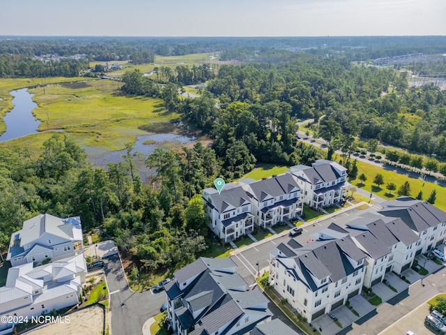 bird's eye view with a water view and a residential view