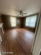 interior space featuring ceiling fan and wood-type flooring