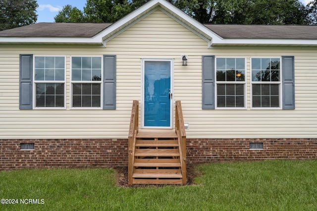 exterior space with a lawn