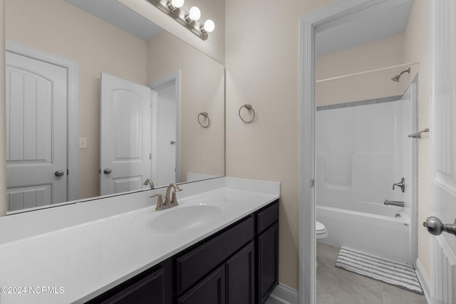 full bathroom with vanity, toilet, shower / bath combination, and tile patterned flooring