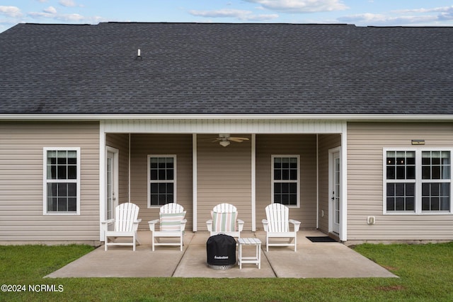 back of house with a patio, a yard, and ceiling fan