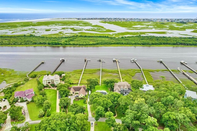 bird's eye view with a water view