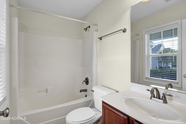 full bath featuring shower / bathing tub combination, vanity, and toilet