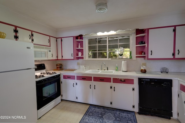 212 S Main St, Bath, NC 27808 - kitchen featuring white appliances, open shelves, ornamental molding, light countertops, and light floors
