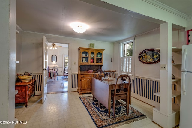 212 S Main St, Bath, NC 27808 - dining area featuring light floors, ornamental molding, and a ceiling fan