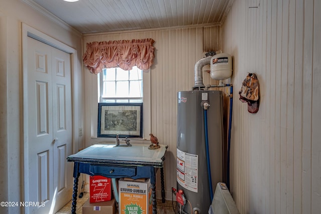 utility room with water heater