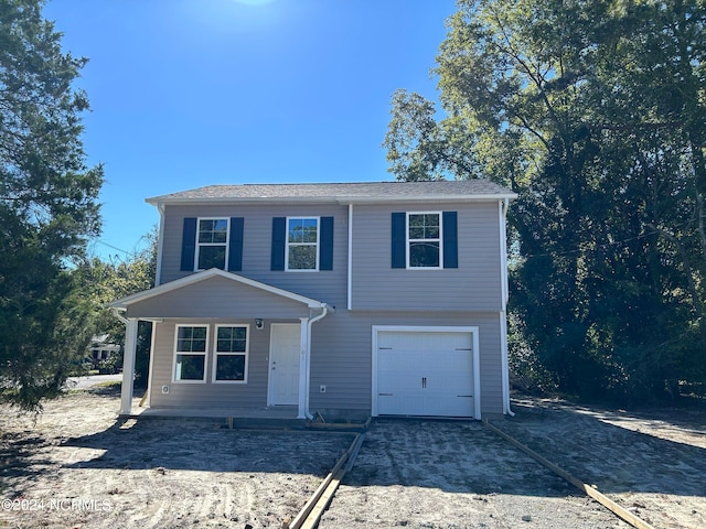 front of property featuring a garage