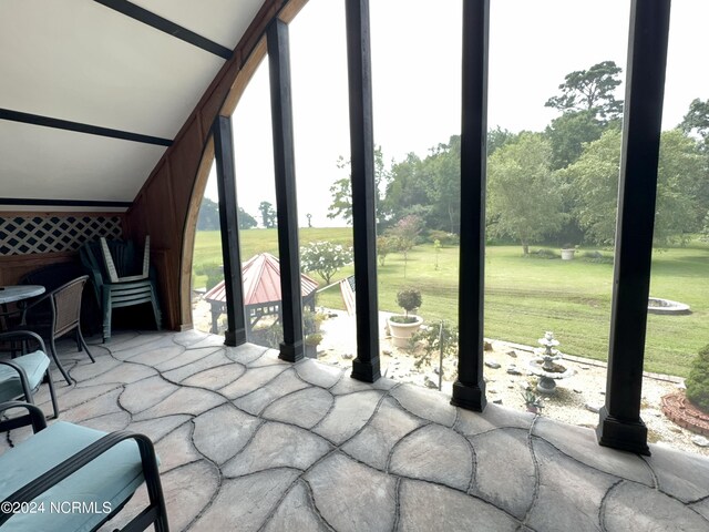 interior space featuring lofted ceiling