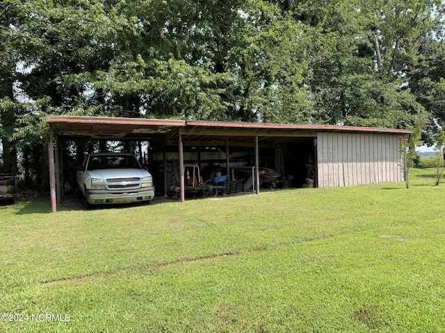 view of parking with a pole building and a carport