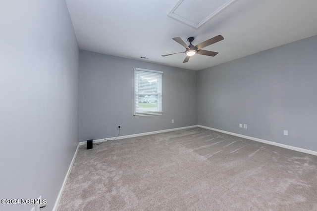 carpeted empty room with ceiling fan