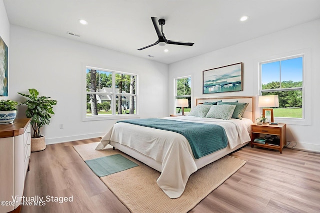 4039 Pintail Ave, Shallotte, NC 28470 - bedroom featuring light wood-type flooring, recessed lighting, and a ceiling fan