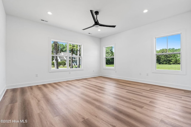 4039 Pintail Ave, Shallotte, NC 28470 - spare room with a ceiling fan, light wood finished floors, and recessed lighting