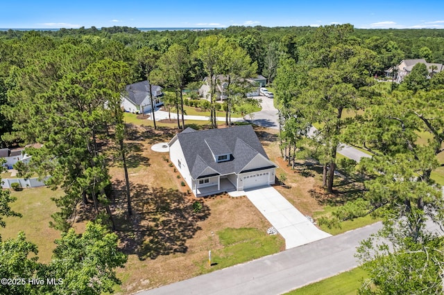 4039 Pintail Ave, Shallotte, NC 28470 - view from above of property featuring a heavily wooded area