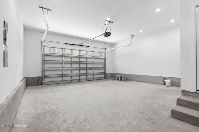 4039 Pintail Ave, Shallotte, NC 28470 - garage with a garage door opener and recessed lighting