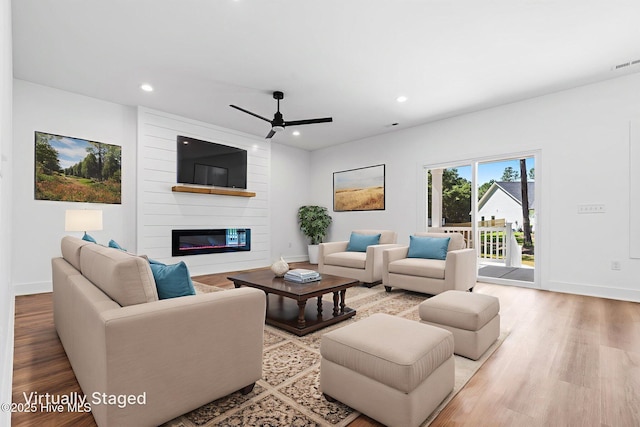4039 Pintail Ave, Shallotte, NC 28470 - living room featuring ceiling fan, recessed lighting, wood finished floors, and a large fireplace