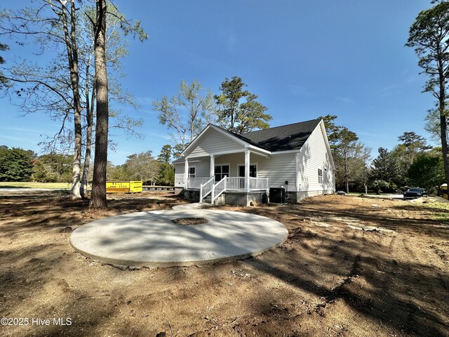 4039 Pintail Ave, Shallotte, NC 28470 - view of front facade with covered porch and a shingled roof