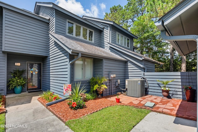 view of front of property with cooling unit