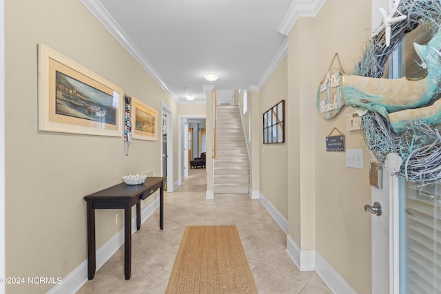 hallway featuring light tile patterned flooring and crown molding