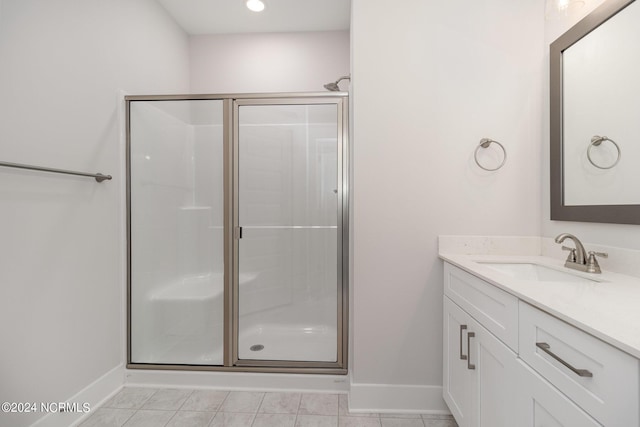 bathroom with vanity and walk in shower