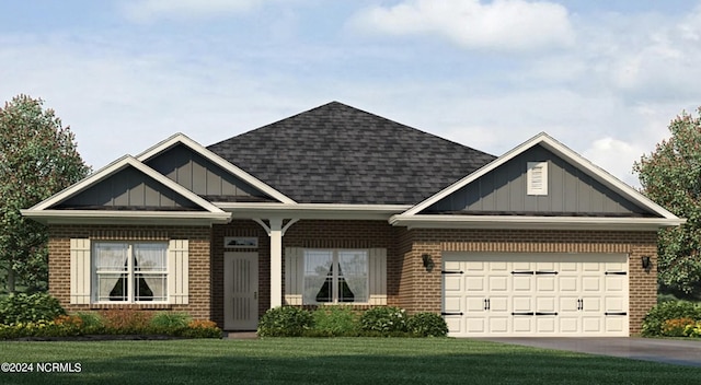 craftsman-style house with driveway, brick siding, board and batten siding, and a front yard