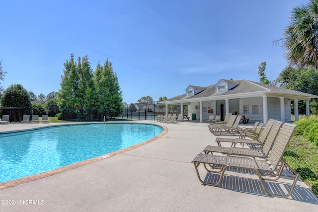 view of pool featuring a patio