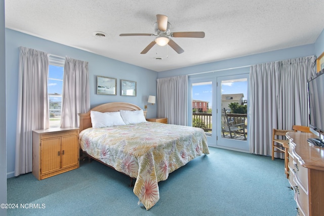 bedroom with ceiling fan, carpet, multiple windows, and access to outside