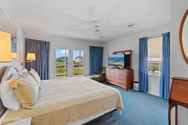 bedroom featuring ceiling fan, carpet flooring, access to exterior, and multiple windows