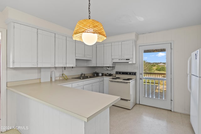 kitchen with pendant lighting, white cabinets, light tile patterned floors, kitchen peninsula, and white appliances