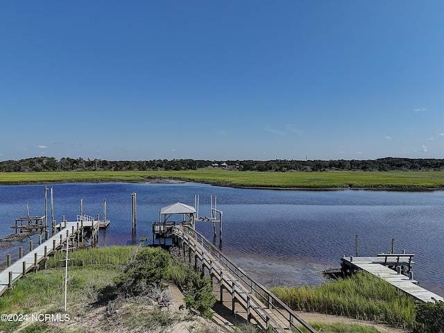 dock area with a water view