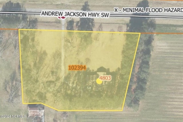 aerial view of property's location featuring property boundaries highlighted