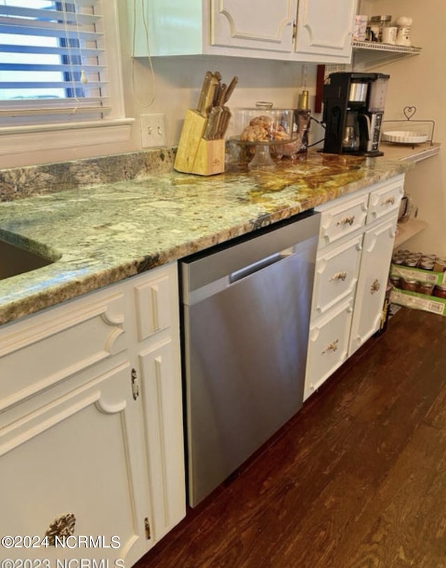 bar area featuring stainless steel dishwasher and dark wood-type flooring
