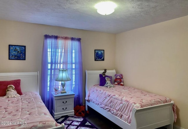 bedroom with a textured ceiling