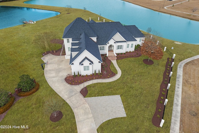 birds eye view of property featuring a water view