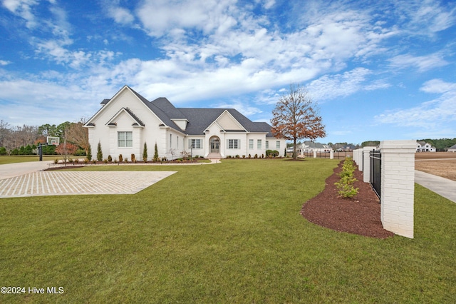 view of front of house with a front lawn