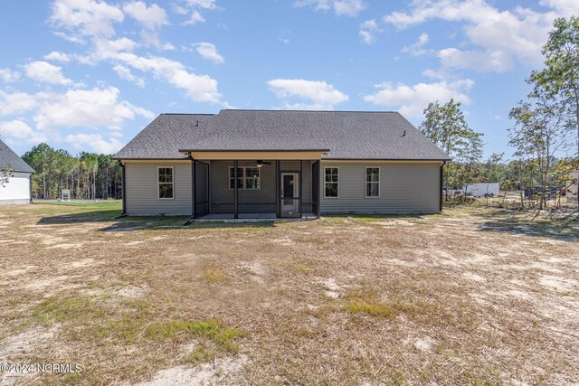 rear view of house featuring a patio and ceiling fan