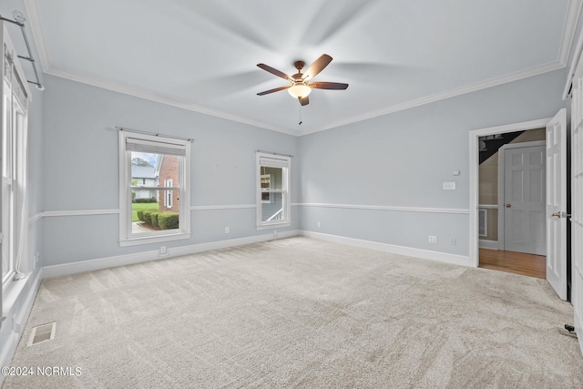 unfurnished bedroom with baseboards, visible vents, and light colored carpet