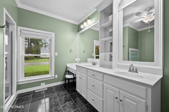 full bath featuring baseboards, ornamental molding, and a sink