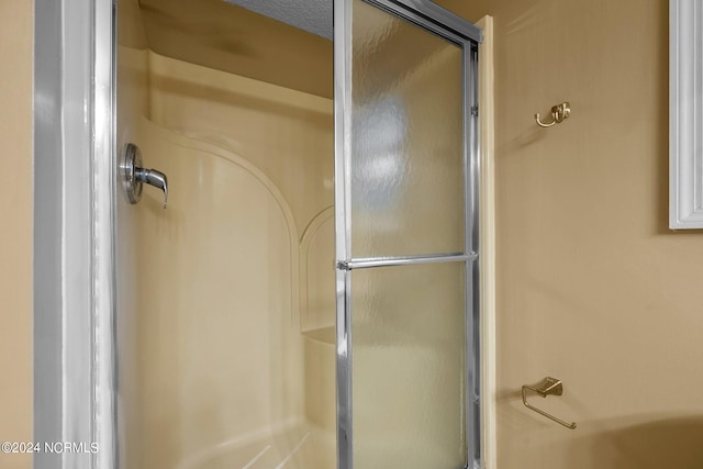 bathroom with a textured ceiling