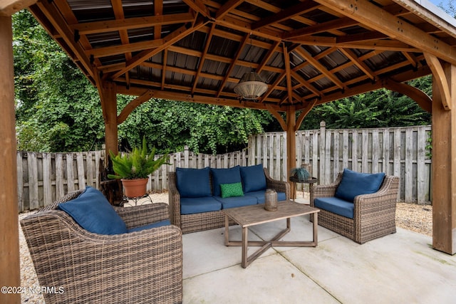 view of patio / terrace with outdoor lounge area and a gazebo