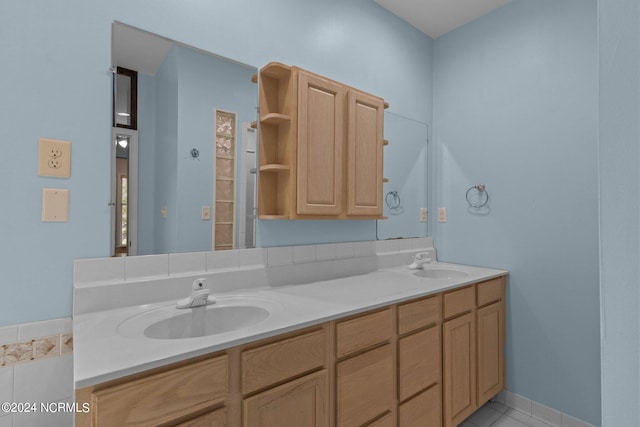 bathroom featuring tile patterned floors and double sink vanity